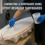 epoxy-surfboard-laminating-scene